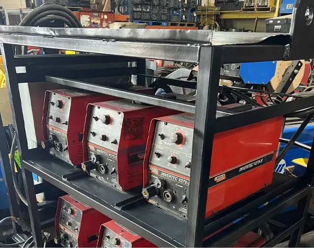 A rack of batteries in the middle of a shop.