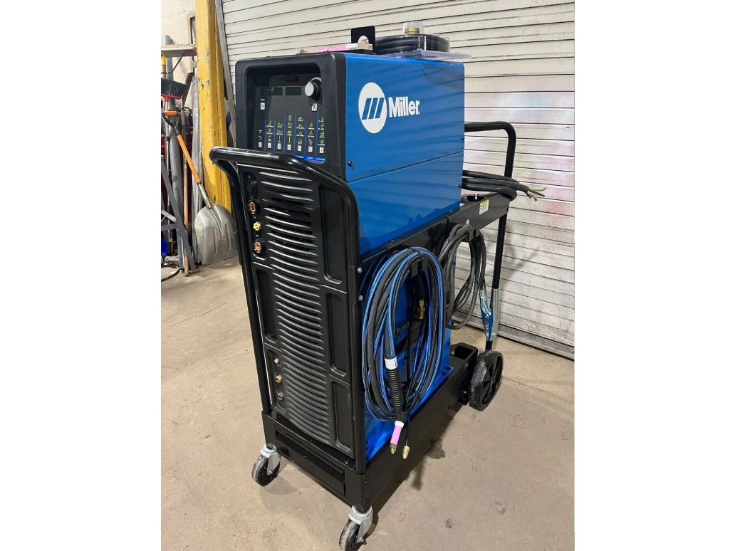 A blue machine is sitting on top of a cart.