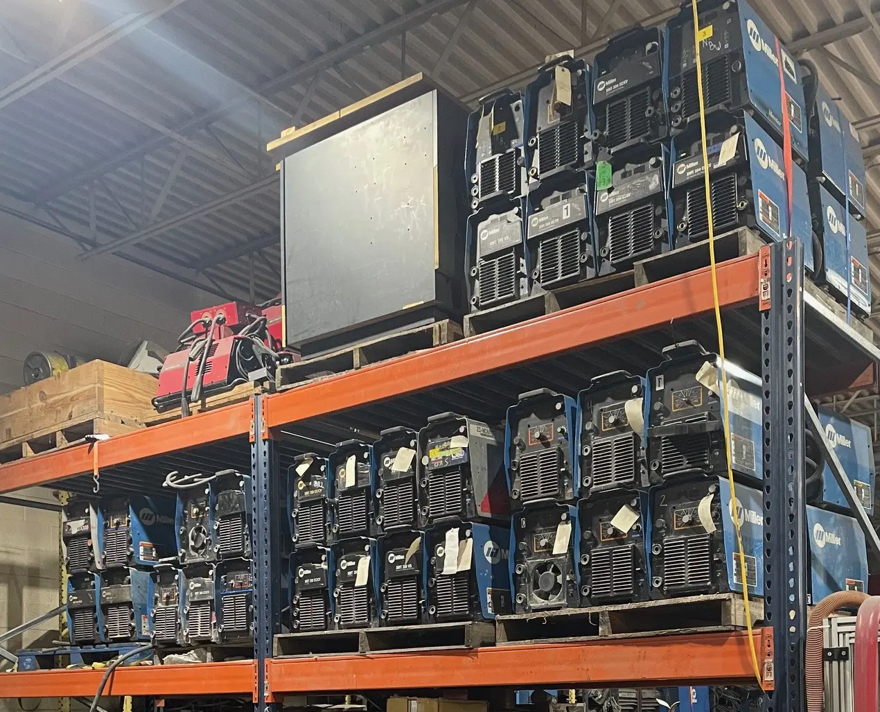 A warehouse filled with lots of racks and boxes.